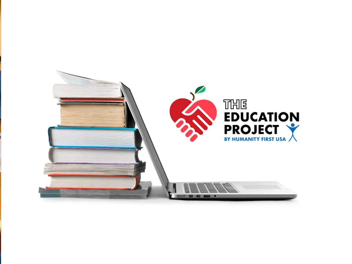 The Education Project by Humanity First USA logo alongside a laptop and books