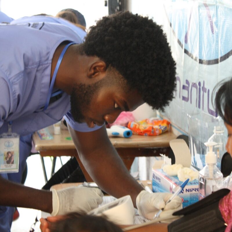 GoH Guatemala June 2023 student taking patient blood pressure