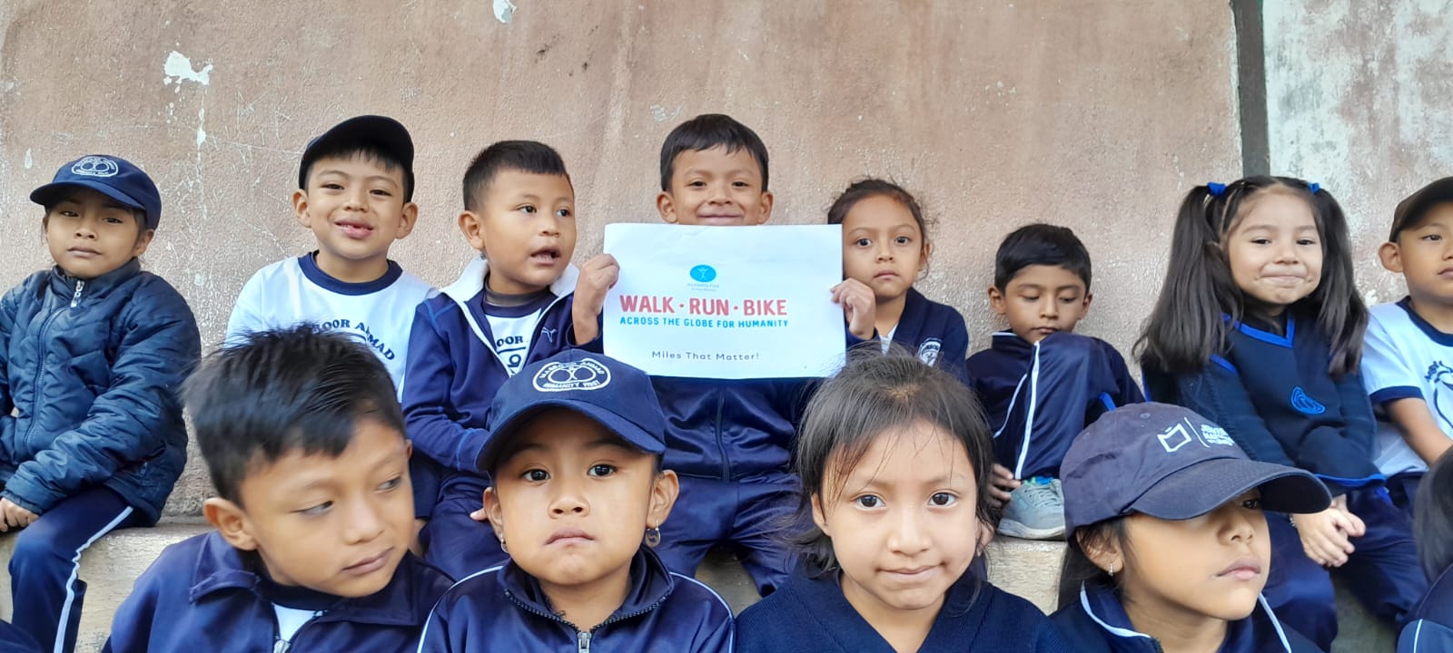 WRB Guatemala Masroor kids in bleachers 202040906