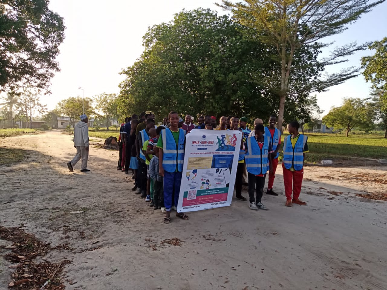 WRB Tanzania Dar es Salaam walking with sign 20240907