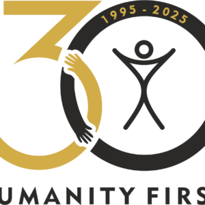 A logo of the number 30 where the curves of the 3 and 0 intersect they look like arms giving each other a hug. The text reads Humanity First 1995-2025.