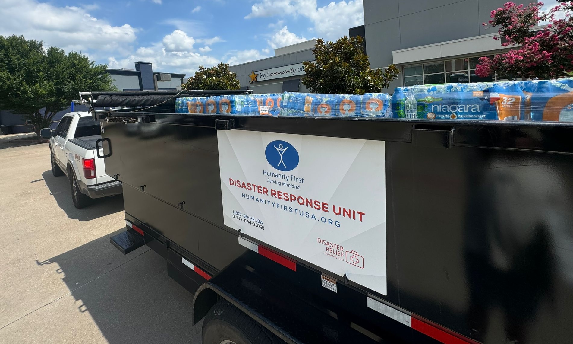 DR Texas Floods truck with water pallets 20250709 cropped